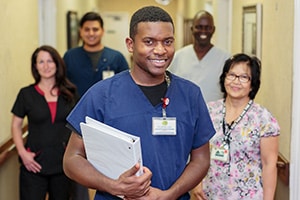 nurses and caregivers in the hallway at the Cottonwood Canyon Healthcare facility